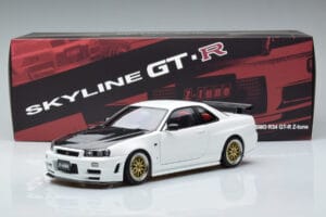 Nissan Skyline GT-R R34 Nismo Z-Tune Branco MotorHelix 1:18 M83407 Metal - imagem 11 de 11