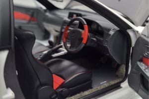 Nissan Skyline GT-R R34 Nismo Z-Tune Branco MotorHelix 1:18 M83407 Metal - imagem 8 de 11