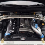 Nissan Skyline GT-R R34 Nismo Z-Tune Branco MotorHelix 1:18 - image 9 of 11