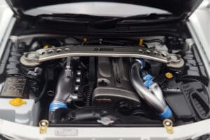 Nissan Skyline GT-R R34 Nismo Z-Tune Branco MotorHelix 1:18 M83407 Metal - imagem 9 de 11