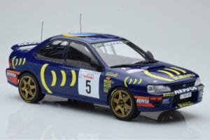 Subaru Impreza 555 #5 C. Sainz / L. Moya Tour de Corse 1995 IXO 1:18 18RMC063A Metal - imagem 4 de 6
