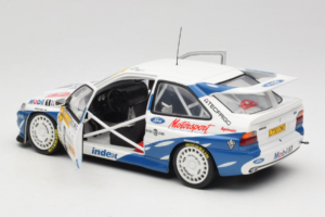 Ford Escort RS Cosworth Mobil 1 #6 F. Delecour / D. Grataloup Rally Monte Carlo Winner 1994 UT Models 1:18 180948106 Metal - imagem 5 de 8
