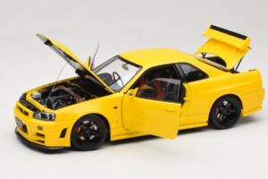 Nissan Skyline GT-R R34 Customized Version Amarelo MotorHelix 1:18 M83412 Metal - imagem 2 de 8