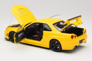 Nissan Skyline GT-R R34 Customized Version Amarelo MotorHelix 1:18 M83412 Metal - imagem 5 de 8