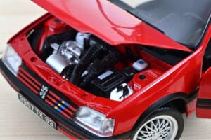 Peugeot 205 GTi 1.9 PTS Deco Vallelunga Vermelho Norev 1:18 184846 Metal - imagem 3 de 3