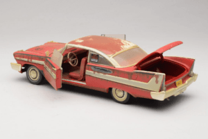 Plymouth Fury Vermelho Christine Versão Suja Auto World 1:18 AWSS119/06 Metal - imagem 5 de 8