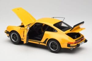 Porsche 911 930 Turbo 3.0 Amarelo Norev 1:18 187579 Metal - imagem 5 de 8