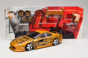Toyota Supra A80 Dourado Tunerz Edition Hot Wheels 1:18 B6091 Metal - imagem 2 de 7