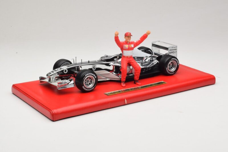 Ferrari F2004 #1 M. Schumacher Six Time World Champion 2004 Cromado Prata Hot Wheels 1:18 C7332 Metal