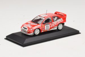 Ford Escort Cosworth Toshiba #11 A. Vatanen / Freeman 1994 Minichamps 1:43 430981811 Metal - imagem 2 de 4