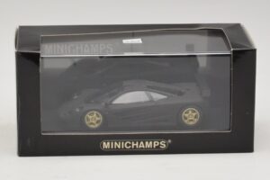 McLaren F1 GTR Prototype Preto Fosco Com Rodas Douradas Minichamps 1:43 MCLAREN008 Metal - imagem 4 de 4