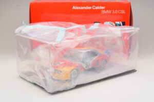 BMW 3.0 CSL Art Car Alexander Calder #51 H. Poulain / S. Posey / J. Guichet 24 Hours of Le Mans 1975 Minichamps 1:18 80430150 - imagem 6 de 7