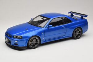 Nissan Skyline GT-R R34 V-Spec II Azul Metálico OEM Jantes KK-Scale 1:12 Nissan Skyline GT-R R34 V-Spec II Azul Metálico OEM Jantes KK-Scale 1:12 KKDC120211-1 Metal